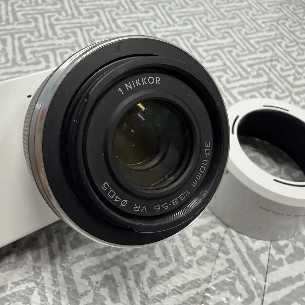 Nikon 1 J1 10.1MP White Camera Bundle - 10-30mm & 30-110mm VR Lenses SD Bag Case